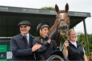 22 July 2023; Trainer Aidan O'Brien, left, jockey Ryan Moore and Savethelastdance after winning the Juddmonte Irish Oaks during day one of the Juddmonte Irish Oaks Weekend at The Curragh Racecourse in Kildare. Photo by Seb Daly/Sportsfile