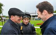 22 July 2023; Trainer Aidan O'Brien, left, jockey Ryan Moore, centre, and owner Paul Smith after sending out Savethelastdance to win the Juddmonte Irish Oaks during day one of the Juddmonte Irish Oaks Weekend at The Curragh Racecourse in Kildare. Photo by Seb Daly/Sportsfile
