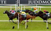22 July 2023; Strike Red, left, with Billy Garrity up, crosses the line to win the Paddy Power Scurry Handicap, from second place Aussie Girl, 13, with Jamie Powell up, during day one of the Juddmonte Irish Oaks Weekend at The Curragh Racecourse in Kildare. Photo by Seb Daly/Sportsfile