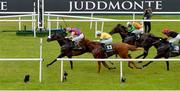 22 July 2023; Strike Red, left, with Billy Garrity up, on their way to winning the Paddy Power Scurry Handicap, from second place Aussie Girl, 13, with Jamie Powell up, during day one of the Juddmonte Irish Oaks Weekend at The Curragh Racecourse in Kildare. Photo by Seb Daly/Sportsfile