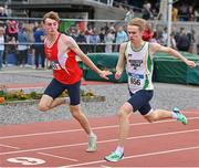 22 July 2023; Dannan Long of Enniscorthy A.C., Wexford, left, and Max O'Reilly of Riverstick/Kinsale A.C., Cork, compete in the boy's under 19 100m during day two of the 123.ie National Juvenile Track and Field Championships at Tullamore Harriers Stadium in Offaly. Photo by Stephen Marken/Sportsfile