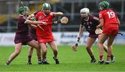 22 July 2023; Hannah Looney of Cork is tackled by Sarah Spellman, left, and Aoife Donohue of Galway during the All-Ireland Camogie Championship semi-final match between Cork and Galway at UPMC Nowlan Park in Kilkenny. Photo by Piaras Ó Mídheach/Sportsfile