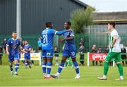 22 July 2023; Romeo Akachukwu of Waterford, right, celebrates after scoring his side's fifth goal with teammate Christie Pattisson during the Sports Direct Men’s FAI Cup First Round match between St. Michael’s and Waterford at Cooke Park in Tipperary. Photo by Michael P Ryan/Sportsfile