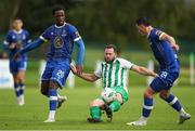 22 July 2023; Joseph Mulcahy of St. Michael’s in action against Waterford players Roland Idowu, left, and Ronan Coughlan during the Sports Direct Men’s FAI Cup First Round match between St. Michael’s and Waterford at Cooke Park in Tipperary. Photo by Michael P Ryan/Sportsfile