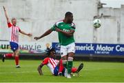 22 July 2023; Tunde Owolabi of Cork City in action against Darren Nwankwo of Treaty United during the Sports Direct Men’s FAI Cup First Round match between Treaty United and Cork City at Markets Field in Limerick. Photo by Michael P Ryan/Sportsfile