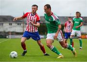 22 July 2023; Ally Gilcrist of Cork City in action against Ben O'Riordan of Treaty United during the Sports Direct Men’s FAI Cup First Round match between Treaty United and Cork City at Markets Field in Limerick. Photo by Michael P Ryan/Sportsfile