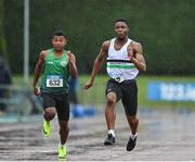 22 July 2023; Mathdenzel Mugri of Cabinteely A.C., Dublin, left, and David Ebo of Midleton A.C., Cork, compete in the boy's under 17 100m during day two of the 123.ie National Juvenile Track and Field Championships at Tullamore Harriers Stadium in Offaly. Photo by Stephen Marken/Sportsfile