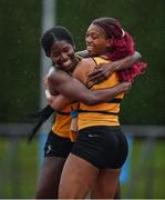 22 July 2023; Fatima Amusa is congratulated by club mate Okwu Backari of Leevale A.C., Cork, following her victory in the girl's under 18 100m during day two of the 123.ie National Juvenile Track and Field Championships at Tullamore Harriers Stadium in Offaly. Photo by Stephen Marken/Sportsfile