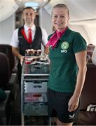 23 July 2023; Republic of Ireland's flight attendant Ruesha Littlejohn and Qantas cabin manager Paulo Guerreiro during their flight from their base in Brisbane to Perth for their FIFA Women's World Cup 2023 group match against Canada, on Wednesday. Photo by Stephen McCarthy/Sportsfile