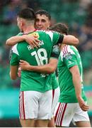 z1i22 July 2023; Joshua Honohan of Cork City, left, is congratulated by teammate Barry Coffey after he scored his sides first goal during the Sports Direct Men’s FAI Cup First Round match between Treaty United and Cork City at Markets Field in Limerick. Photo by Michael P Ryan/Sportsfile