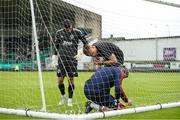 22 July 2023; Treaty United manager Tommy Barrett tends to the goal netting before the Sports Direct Men’s FAI Cup First Round match between Treaty United and Cork City at Markets Field in Limerick. Photo by Michael P Ryan/Sportsfile