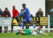22 July 2023; Roland Idowu of Waterford is tackled by Dale O'Mahony of St. Michael's during the Sports Direct Men’s FAI Cup First Round match between St. Michael’s and Waterford at Cooke Park in Tipperary. Photo by Michael P Ryan/Sportsfile