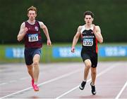23 July 2023; Brendan O'Leary of Lios Tuathail A.C., Kerry, left, and Shane Mulligan of Shercock A.C., Cavan, compete in the boy's under 19 200m during day three of the 123.ie National Juvenile Track and Field Championships at Tullamore Harriers Stadium in Offaly. Photo by Stephen Marken/Sportsfile