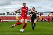 23 July 2023; Fionnula Morgan of Cliftonville in action against Aisling Meaney of Galway United during the 2023 AVENIR Sports All-Island Cup final match between Cliftonville and Galway United at The Showgrounds in Sligo. Photo by Michael P Ryan/Sportsfile
