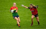 23 July 2023; Sara Doyle of Carlow in action against Orla Swail of Down during the TG4 LGFA All-Ireland Junior Championship semi-final match between Down and Carlow at Parnell Park in Dublin. Photo by Eóin Noonan/Sportsfile