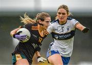 23 July 2023; Orlaith Prenter of Antrim in action against Siofra Ni Chonaill of Clare during the TG4 LGFA All-Ireland Intermediate Championship semi-final match between Antrim and Clare at Glennon Brothers Pearse Park, Longford. Photo by Tom Beary/Sportsfile