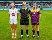 23 July 2023; Referee Philip Conway with Kildare captain Grace Clifford and Wexford captain Roisin Murphy of Wexford during the TG4 LGFA All-Ireland Intermediate Championship semi-final match between Wexford and Kildare at Parnell Park in Dublin. Photo by Eóin Noonan/Sportsfile
