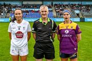 23 July 2023; Referee Philip Conway with Kildare captain Grace Clifford and Wexford captain Roisin Murphy of Wexford during the TG4 LGFA All-Ireland Intermediate Championship semi-final match between Wexford and Kildare at Parnell Park in Dublin. Photo by Eóin Noonan/Sportsfile
