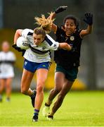 23 July 2023; Aisling Reidy of Clare is tackled by Lara Dahunsi of Antrim during the TG4 LGFA All-Ireland Intermediate Championship semi-final match between Antrim and Clare at Glennon Brothers Pearse Park, Longford. Photo by Tom Beary/Sportsfile