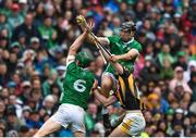 23 July 2023; Diarmaid Byrnes of Limerick catches the sliotar ahead of teamate William O'Donoghue and Eoin Cody of Kilkenny during the GAA Hurling All-Ireland Senior Championship final match between Kilkenny and Limerick at Croke Park in Dublin. Photo by Brendan Moran/Sportsfile