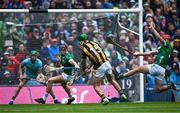 23 July 2023; Eoin Cody of Kilkenny scores his side's first goal despite the efforts of Limerick players Diarmaid Byrnes and Barry Nash during the GAA Hurling All-Ireland Senior Championship final match between Kilkenny and Limerick at Croke Park in Dublin. Photo by Piaras Ó Mídheach/Sportsfile