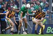 23 July 2023; Aaron Gillane of Limerick shoots wide under pressure from Kilkenny players from left Paddy Deegan and Huw Lawlor during the GAA Hurling All-Ireland Senior Championship final match between Kilkenny and Limerick at Croke Park in Dublin. Photo by Piaras Ó Mídheach/Sportsfile