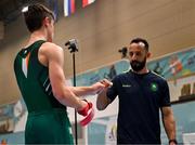 23 July 2023; Ireland coach Hugo Lopes de Oliveira, right, fist bumps James Hickey of Ireland during a podium training session at the 2023 Summer European Youth Olympic Festival at the Branik Tennis Club in Maribor, Slovenia. Photo by Tyler Miller/Sportsfile