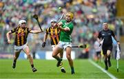 23 July 2023; Cathal O'Neill of Limerick scores a point despite the efforts of Cian Kenny, left, and TJ Reid of Kilkenny during the GAA Hurling All-Ireland Senior Championship final match between Kilkenny and Limerick at Croke Park in Dublin. Photo by Sam Barnes/Sportsfile
