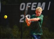 23 July 2023; Zac Naughton of Ireland in action against Peter Zavacky of Slovakia in the Boys Singles Round 1 during 2023 Summer European Youth Olympic Festival at the Branik Tennis Club in Maribor, Slovenia. Photo by Tyler Miller/Sportsfile