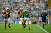 23 July 2023; Cathal O'Neill of Limerick scores a point despite the efforts of Cian Kenny, left, and TJ Reid of Limerick during the GAA Hurling All-Ireland Senior Championship final match between Kilkenny and Limerick at Croke Park in Dublin. Photo by Sam Barnes/Sportsfile