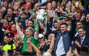23 July 2023; Limerick players Cian Lynch, left, and Declan Hannon lift the Liam MacCarthy after his side's victory in the GAA Hurling All-Ireland Senior Championship final match between Kilkenny and Limerick at Croke Park in Dublin. Photo by Sam Barnes/Sportsfile