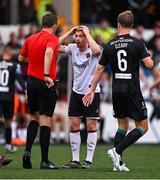 23 July 2023; Paul Doyle of Dundalk reacts as referee Robert Harvey reaches for a red card during the Sports Direct Men’s FAI Cup First Round match between Dundalk and Shamrock Rovers at Oriel Park in Dundalk, Louth. Photo by Ben McShane/Sportsfile