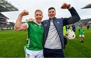 23 July 2023; Cian Lynch of Limerick celebrates with injured Limerick captain Declan Hannon after the GAA Hurling All-Ireland Senior Championship final match between Kilkenny and Limerick at Croke Park in Dublin. Photo by Ramsey Cardy/Sportsfile