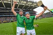 23 July 2023; Limerick players Diarmaid Byrnes, left, and Mike Casey celebrate after the GAA Hurling All-Ireland Senior Championship final match between Kilkenny and Limerick at Croke Park in Dublin. Photo by Ramsey Cardy/Sportsfile