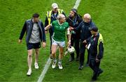 23 July 2023; GAA officials guide Limerick captain Cian Lynch, along with Declan Hannon towards the Hogan Stand for the cup presentation after the GAA Hurling All-Ireland Senior Championship final match between Kilkenny and Limerick at Croke Park in Dublin. Photo by Daire Brennan/Sportsfile