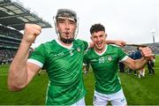 23 July 2023; Limerick players Diarmaid Byrnes, left, and Colin Coughlan celebrate after the GAA Hurling All-Ireland Senior Championship final match between Kilkenny and Limerick at Croke Park in Dublin. Photo by Ramsey Cardy/Sportsfile