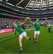23 July 2023; Darragh O'Donovan, left, and Diarmaid Byrnes of Limerick with the Liam MacCarthy Cup after the GAA Hurling All-Ireland Senior Championship final match between Kilkenny and Limerick at Croke Park in Dublin. Photo by Ramsey Cardy/Sportsfile