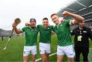 23 July 2023; Limerick players Conor Boylan, left, Dan Morrissey and William O'Donoghue celebrate after the GAA Hurling All-Ireland Senior Championship final match between Kilkenny and Limerick at Croke Park in Dublin. Photo by Ramsey Cardy/Sportsfile