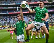 23 July 2023; David Reidy, left, and Cathal O'Neill of Limerick with the Liam MacCarthy Cup after the GAA Hurling All-Ireland Senior Championship final match between Kilkenny and Limerick at Croke Park in Dublin. Photo by Ramsey Cardy/Sportsfile