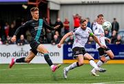 23 July 2023; Andy Boyle of Dundalk clears ahead of Johnny Kenny of Shamrock Rovers during the Sports Direct Men’s FAI Cup First Round match between Dundalk and Shamrock Rovers at Oriel Park in Dundalk, Louth. Photo by Ben McShane/Sportsfile