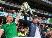 23 July 2023; Limerick players Cian Lynch, left, and Declan Hannon lift the Liam MacCarthy Cup after their side's victory in the GAA Hurling All-Ireland Senior Championship final match between Kilkenny and Limerick at Croke Park in Dublin. Photo by Ray McManus/Sportsfile