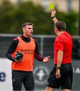 23 July 2023; Dundalk goalkeeper Mark Byrne recieves a yellow card from referee Robert Harvey after the Sports Direct Men’s FAI Cup First Round match between Dundalk and Shamrock Rovers at Oriel Park in Dundalk, Louth. Photo by Ben McShane/Sportsfile