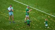 23 July 2023; Limerick players Graeme Mulcahy, right, and daughter Róise, and Nickie Quaid and his son Dáithí after the GAA Hurling All-Ireland Senior Championship final match between Kilkenny and Limerick at Croke Park in Dublin. Photo by Daire Brennan/Sportsfile