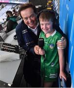 23 July 2023; RTÉ broadcaster Marty Morrissey with Limerick supporter Tadhg O'Donoghue, aged 6, from Newcastle West, Co Limerick, after the GAA Hurling All-Ireland Senior Championship final match between Kilkenny and Limerick at Croke Park in Dublin. Photo by Daire Brennan/Sportsfile