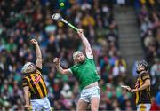 23 July 2023; Cian Lynch of Limerick in action against Pádraig Walsh, left, and Mikey Butler of Kilkenny during the GAA Hurling All-Ireland Senior Championship final match between Kilkenny and Limerick at Croke Park in Dublin. Photo by Piaras Ó Mídheach/Sportsfile
