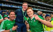 23 July 2023; William O'Donoghue of Limerick with Limerick supporters, Paudie and Brian O'Callaghan, from Knockainey, after the GAA Hurling All-Ireland Senior Championship final match between Kilkenny and Limerick at Croke Park in Dublin. Photo by Ray McManus/Sportsfile