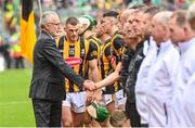 23 July 2023; Uachtarán Chumann Lúthchleas Gael Larry McCarthy is introduced to the Kilkenny team by captain Eoin Cody before the GAA Hurling All-Ireland Senior Championship final match between Kilkenny and Limerick at Croke Park in Dublin. Photo by Ramsey Cardy/Sportsfile
