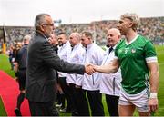 23 July 2023; Uachtarán Chumann Lúthchleas Gael Larry McCarthy is introduced to Limerick captain Cian Lynch before the GAA Hurling All-Ireland Senior Championship final match between Kilkenny and Limerick at Croke Park in Dublin. Photo by Ramsey Cardy/Sportsfile
