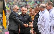 23 July 2023; Uachtarán Chumann Lúthchleas Gael Larry McCarthy is introduced to the referee team by match referee John Keenan before the GAA Hurling All-Ireland Senior Championship final match between Kilkenny and Limerick at Croke Park in Dublin. Photo by Ramsey Cardy/Sportsfile