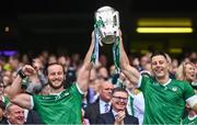 23 July 2023; Tom Morrissey, left, and Dan Morrissey of Limerick lift the Liam MacCarthy Cup after the GAA Hurling All-Ireland Senior Championship final match between Kilkenny and Limerick at Croke Park in Dublin. Photo by Ramsey Cardy/Sportsfile